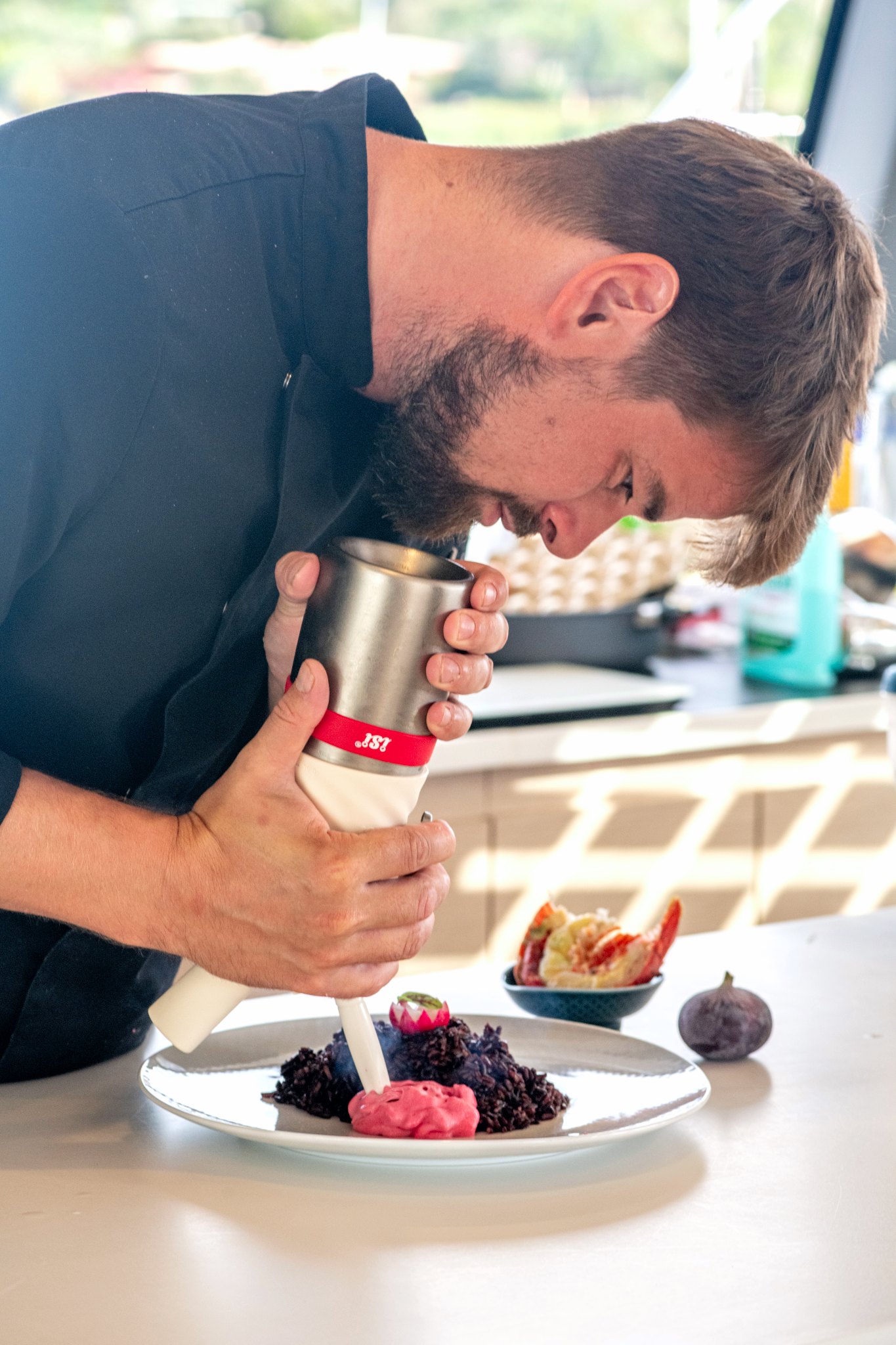 The chef plating a dish